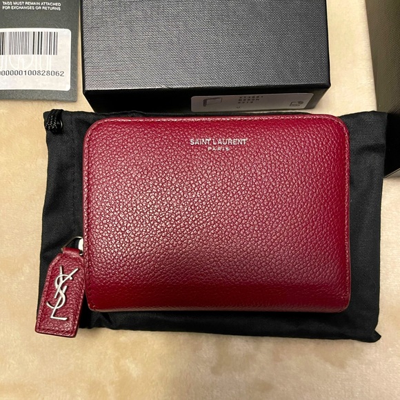 Yves Saint Laurent Handbags - SAINT LAURENT
Grained Calfskin Rive Gauche Compact Zip Around Wallet